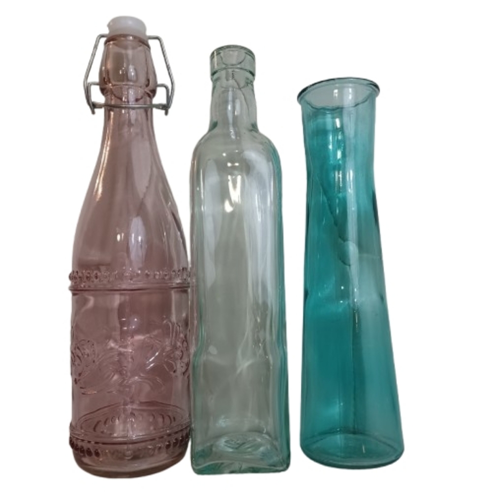 Set of Three Decorative Glass Bottles Clear Glass Light Pink And Teal Vases